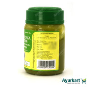 Side view of Mahatiktaka Ghritam - 150GM by Kottakkal Ayurveda - Product details and packaging"
