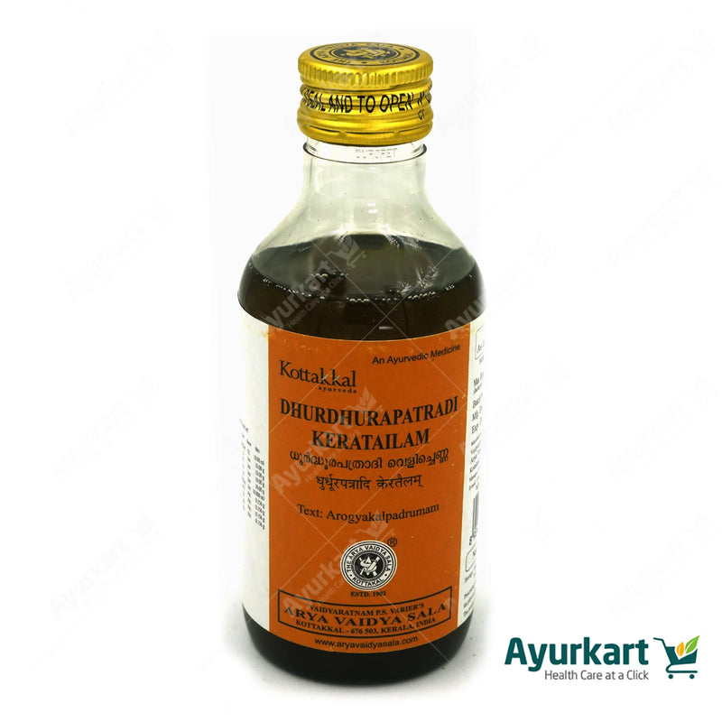 Applying Dhurdhurapatradi Kera Tailam to the scalp for health