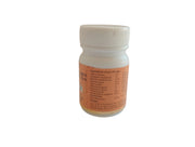 Small white bottle with an orange label on a beige background