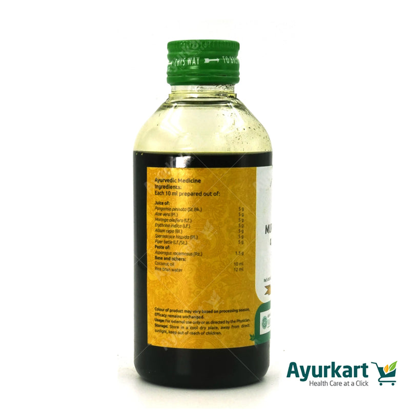 A person using Vaidyaratnam Murivenna for pain relief and faster recovery