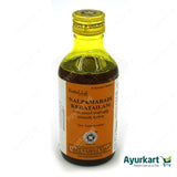 Nalpamaradi Kera Tailam: Ayurvedic Hair Care Oil (Kottakkal, 200ml). Nourishes & strengthens hair, promotes growth & reduces fall. Soothes scalp, fights dandruff. Gentle & safe, natural ingredients. Order online: Ayurkart.com. Note: Consult Ayurvedic Consultant before use.