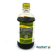 Person consuming Parthadyarishtam to promote heart health and reduce stress