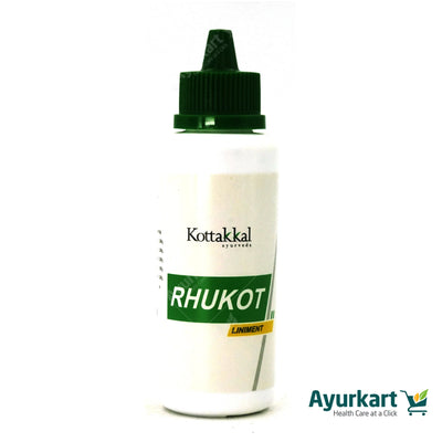 Person using Rhukot Liniment for arthritis and muscle stiffness relie